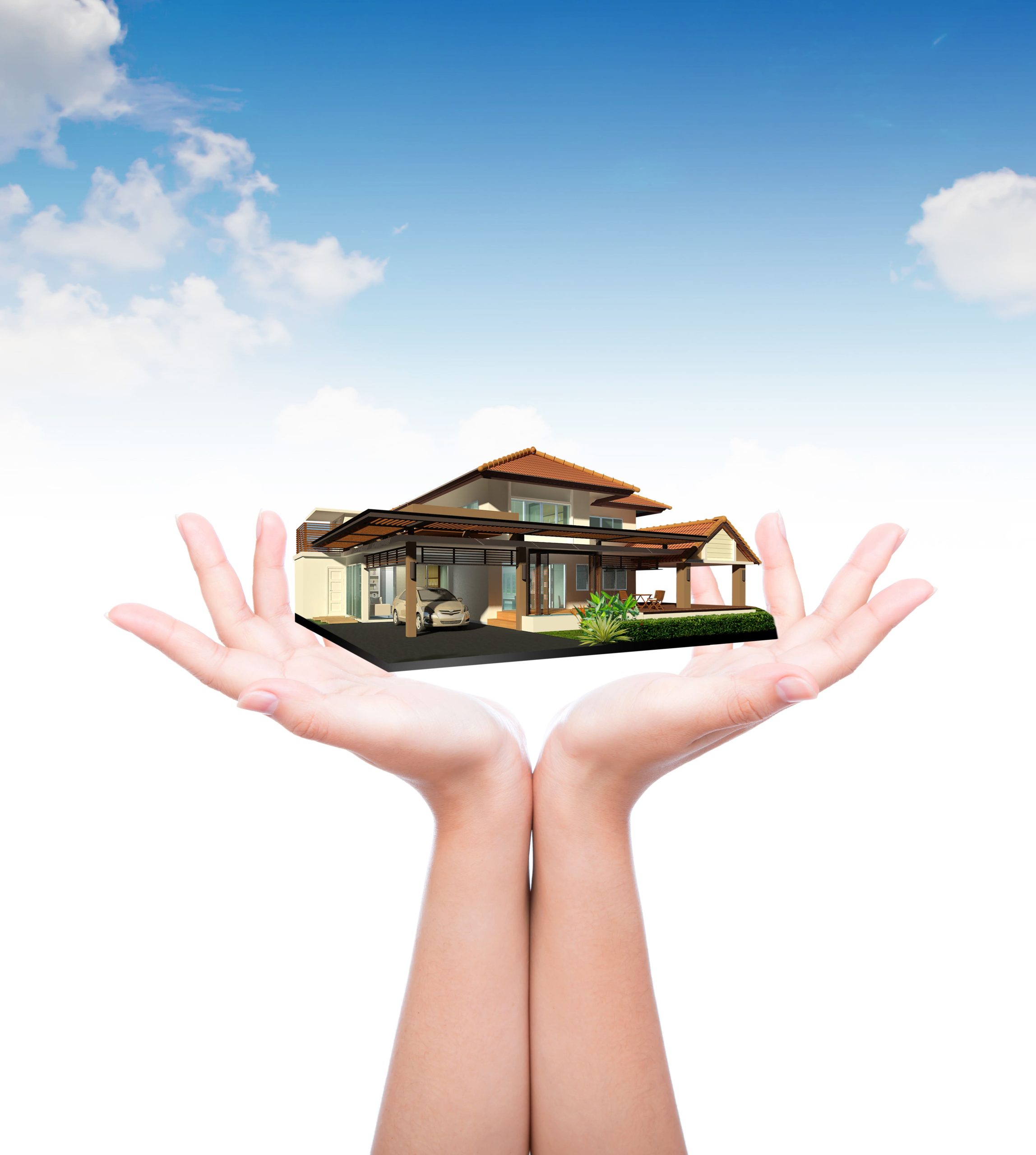 Hands presenting a model of a luxury family home
