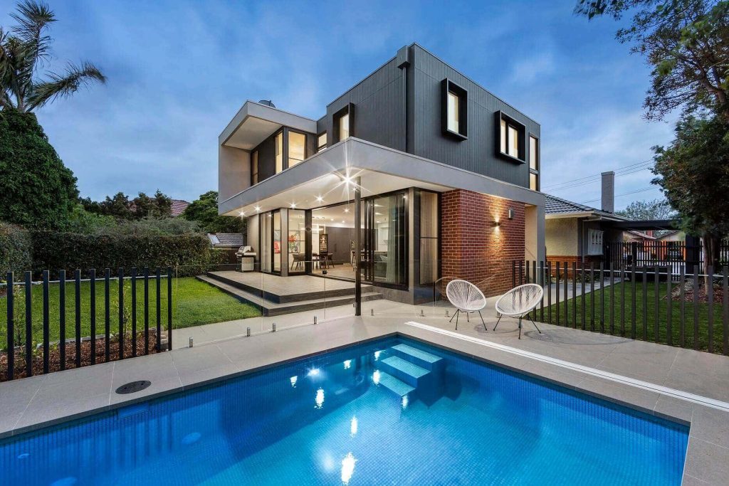 Skyline Ridge Residence: Contemporary hillside home with a dark facade and private swimming pool in Hollywood Hills, Los Angeles, CA