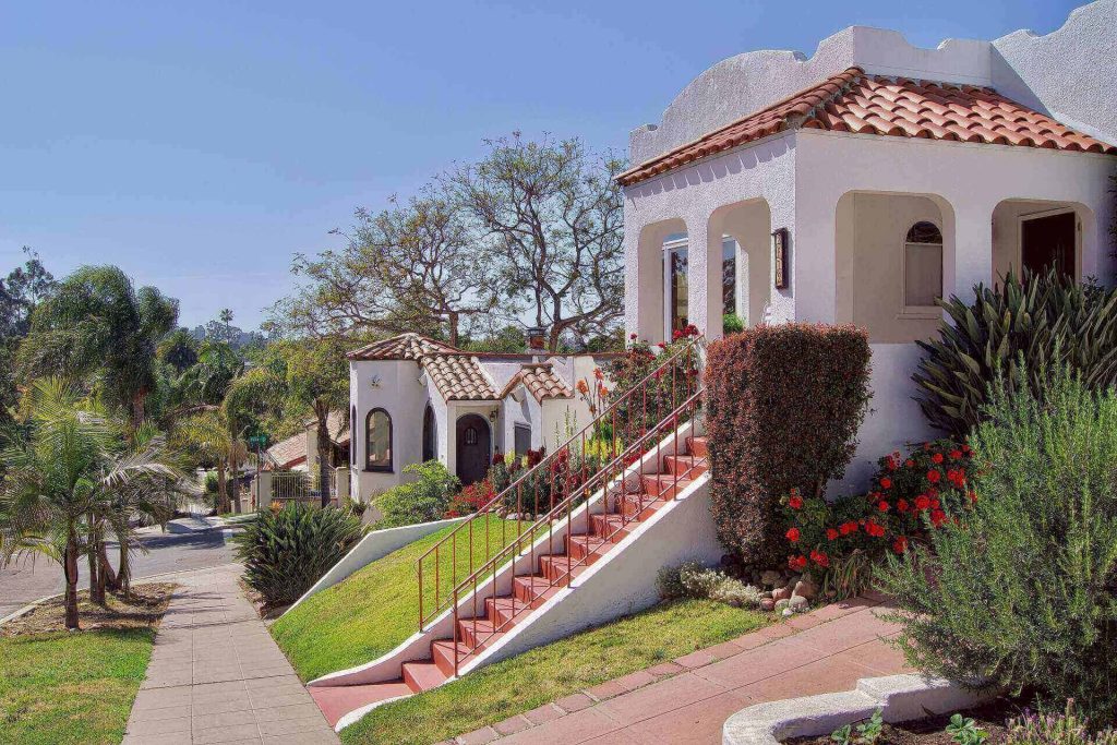 Casa del Mar Villa: Mediterranean-style homes with terracotta roofs on a landscaped hillside in La Jolla, San Diego, CA